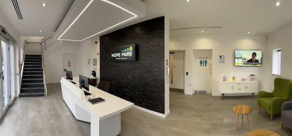 The exterior of Hope Park Quays Reach in Salford with modern signage